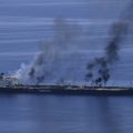 Greek-flagged tanker is burning after Houthi attacks, but no sign of oil spill